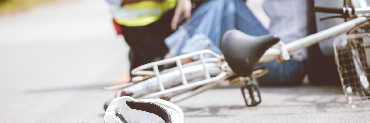Bicycle accident hit by car on the road highway scene driver sitting insurance staff help support